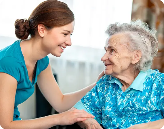 Compassionate caregiver providing In-Home Care for Adults